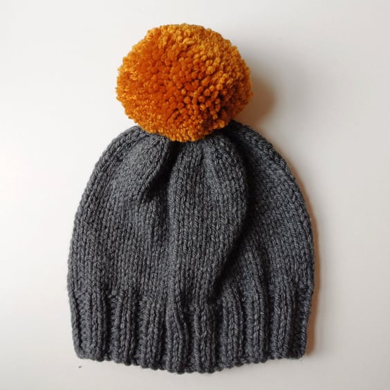 Bobble Hat in Grey Chunky Yarn with Mustard Pom Pom