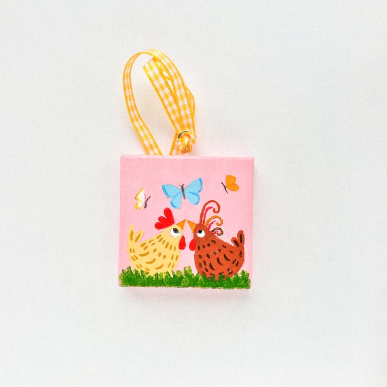Hand painted miniature canvas Cheeky Chickens.