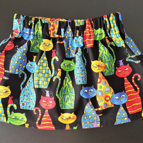 Baby's skirt with fun multicoloured cat print