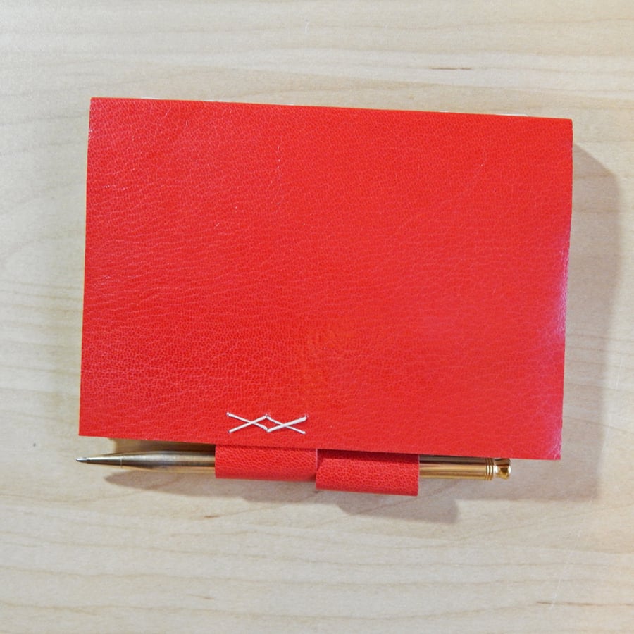 Red Leather journal with pen holder. Hand made book with Florentine Paper 