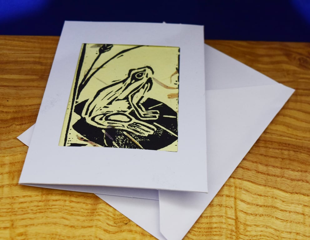 Lino print Frog on yellow paper with petal texture