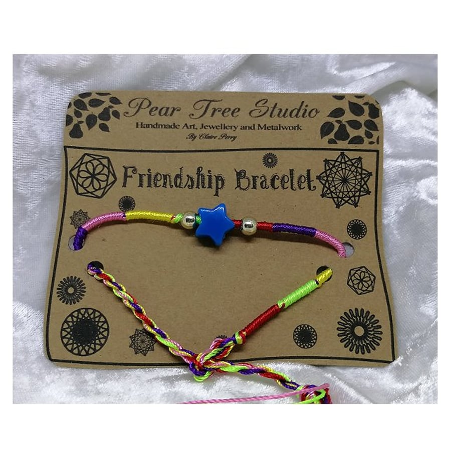 Friendship bracelet with blue Star bead.