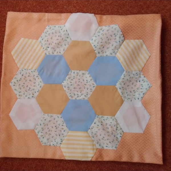 Patchwork cushion cover in peach and pale blue. Approx.16x16 ins 42x42 cm
