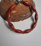 Beaded  Bracelet with Orange and Brown Beads