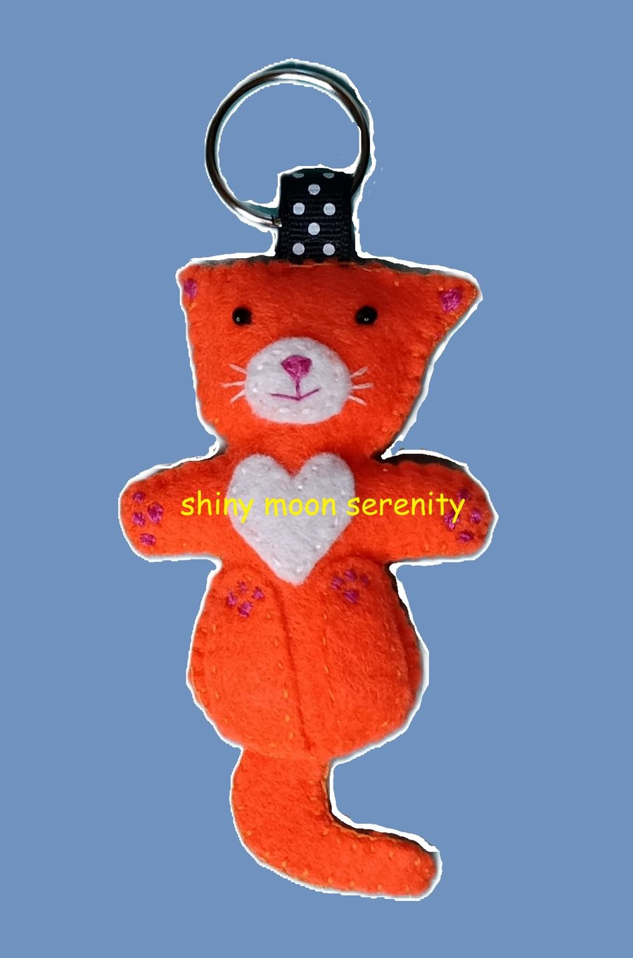 Cat on back Orange and White Felt Keyring.