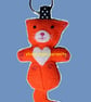 Cat on back Orange and White Felt Keyring.