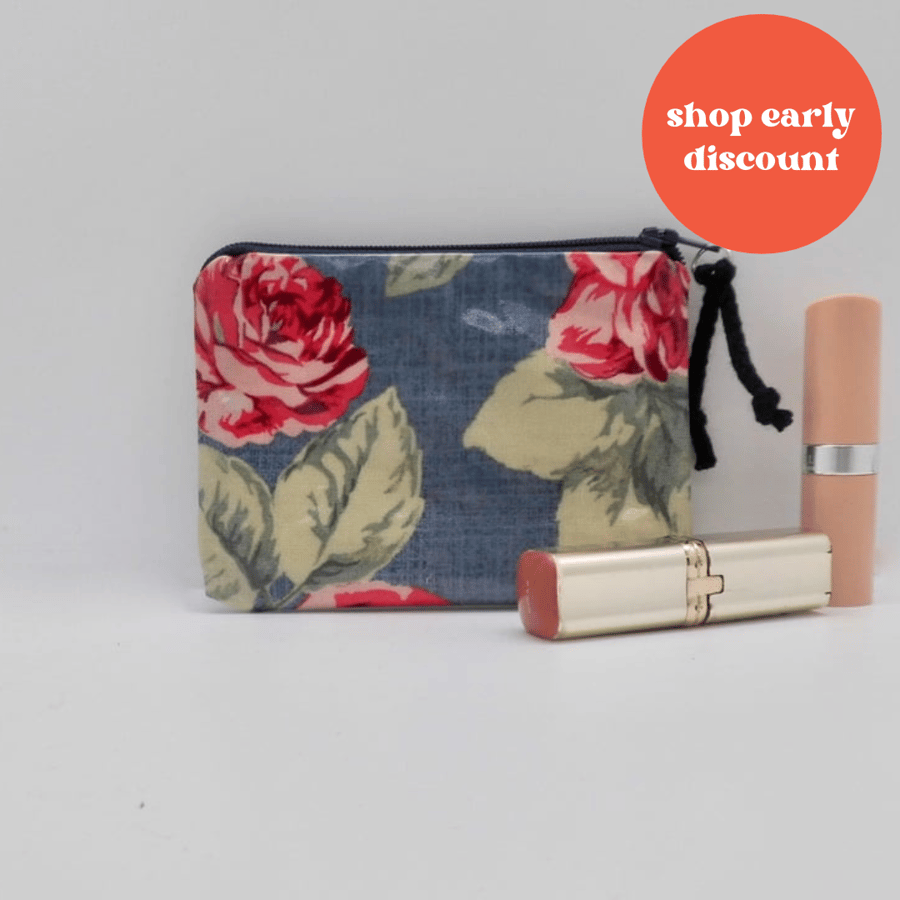 Coin purse in floral oilcloth