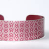 Geometric butterfly print cuff bracelet raspberry