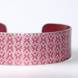 Geometric butterfly print cuff bracelet raspberry