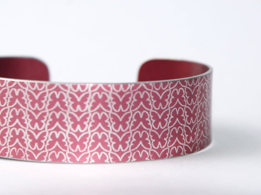 Geometric butterfly print cuff bracelet raspberry