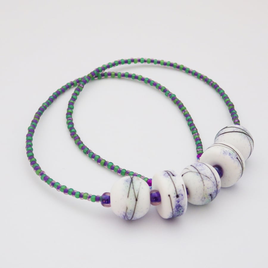 “Heather” white, purple and green lampwork glass bead necklace