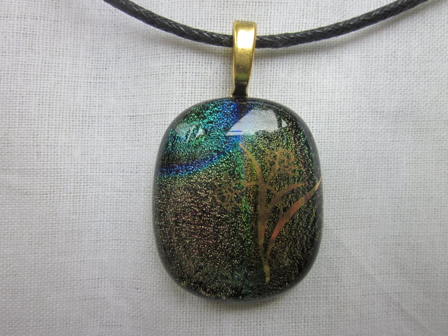 Handmade dichroic glass cabochon pendant - subtle mix with gold daffodils