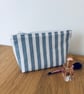 Small cotton makeup bag, pouch, purse, in blue and white stripes.