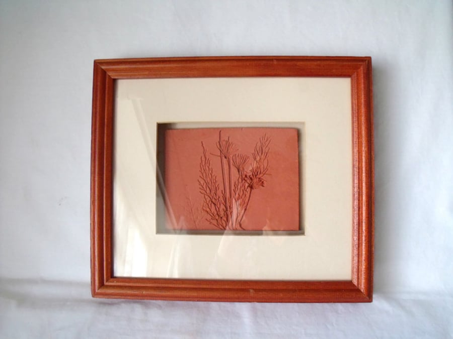 impressed terracotta tile in a box frame, 10 x 12 inches