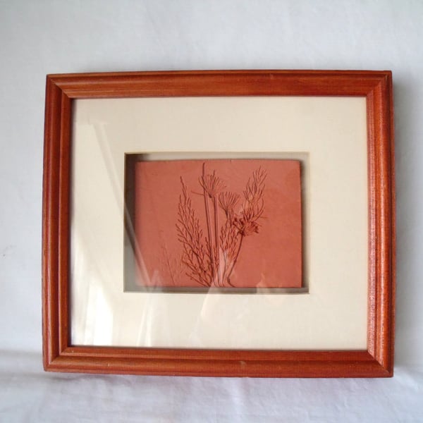 impressed terracotta tile in a box frame, 10 x 12 inches