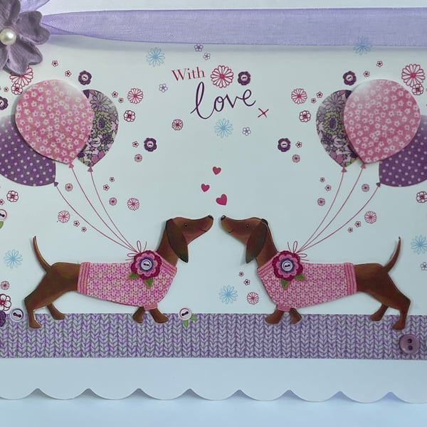 Two Dachshunds with balloons with love anniversay or wedding card