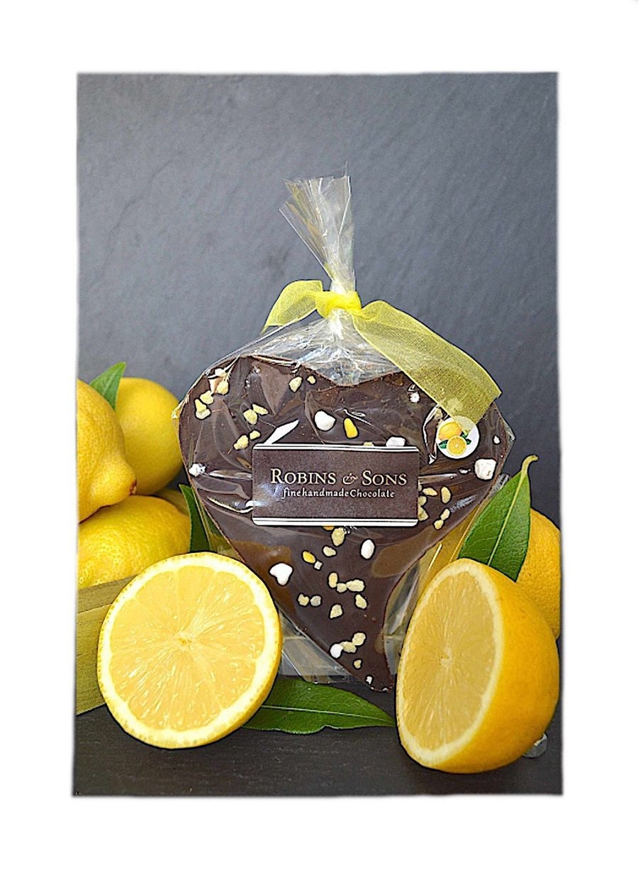 Dark Chocolate LEMON heart with Sicilian lemon oil, lemon crystals & meringue. 