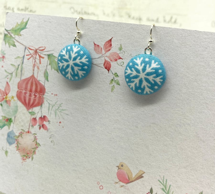 white snowflake on light blue fabric button earrings winter season gift ideas