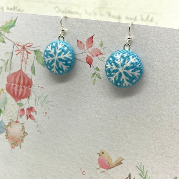 white snowflake on light blue fabric button earrings winter season gift ideas