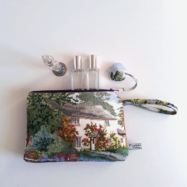 Make up bag clutch bag upcycled from a vintage cottage garden scene embroidery