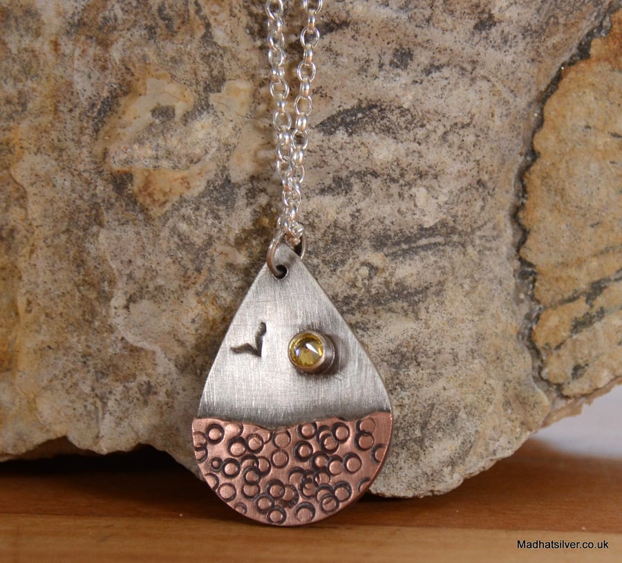 REDUCED Silver and copper teardrop shape beach pendant with sparkling sun
