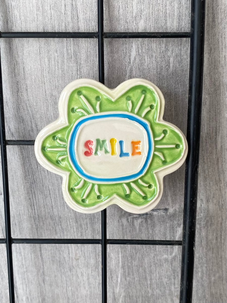 Large Smile pottery magnet green