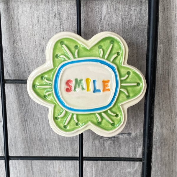 Large Smile pottery magnet green