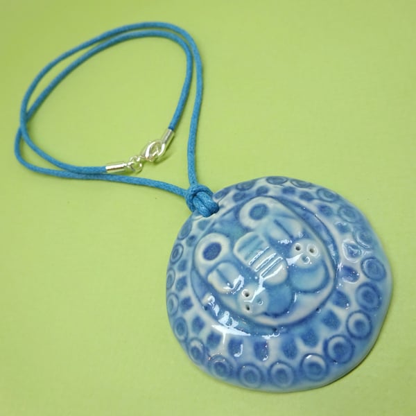 Mid century blue lion pendant necklace