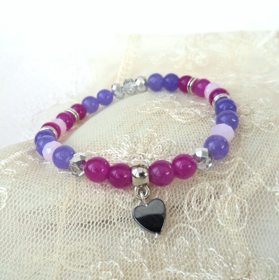 Purple and pink stretchy bracelet, with hematite heart charm