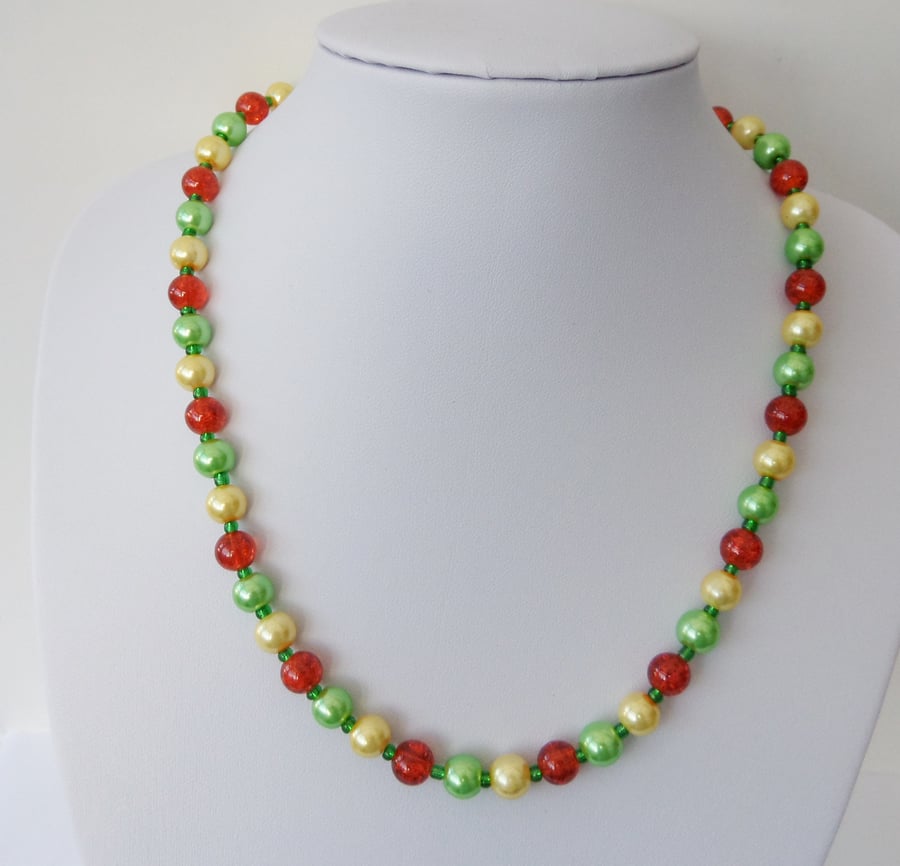 Orange, yellow and green glass pearl and crackle bead necklace.