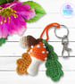 Orange toadstool, acorn and oak leaves crochet bag charm. Toadstool keyring