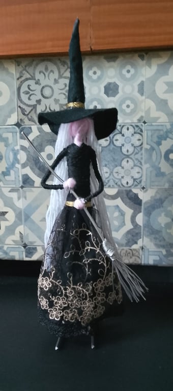 Witch figure  would look good on any shelf 