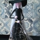 Witch figure  would look good on any shelf 
