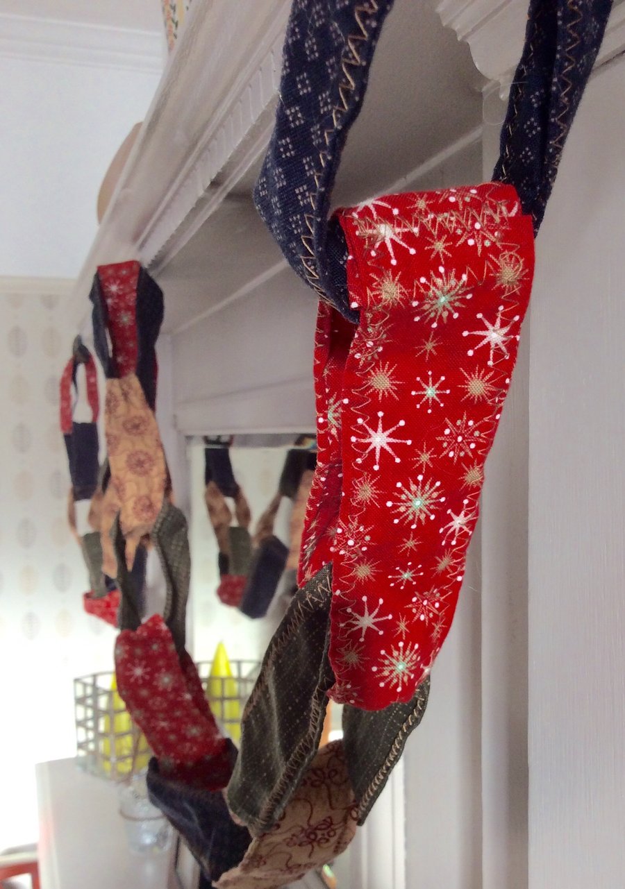 Christmas hanging Garland. Christmas decoration in a paper chain design.