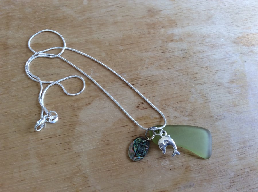 Sea glass pendant with charms