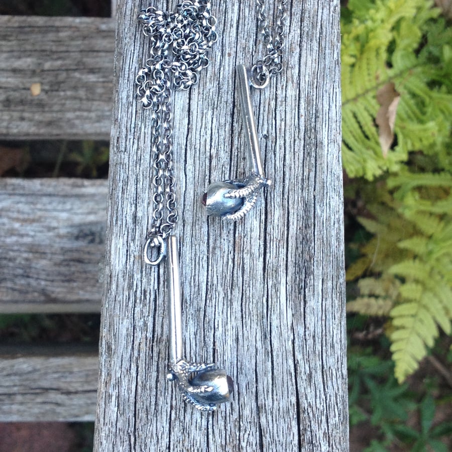 Thames garnet Egg and Claw pipe charm