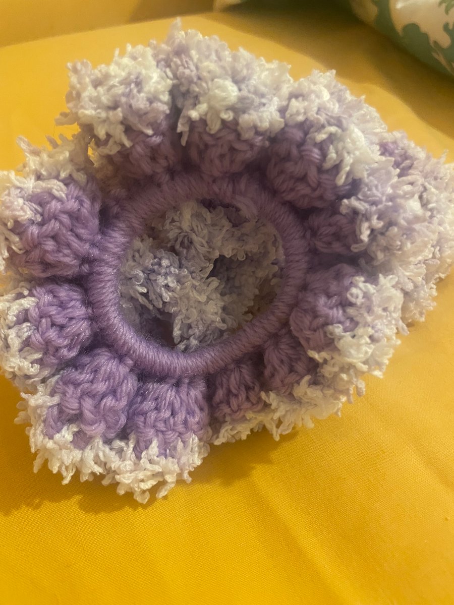 Purple scrunchie with purple and white fluffy edging 