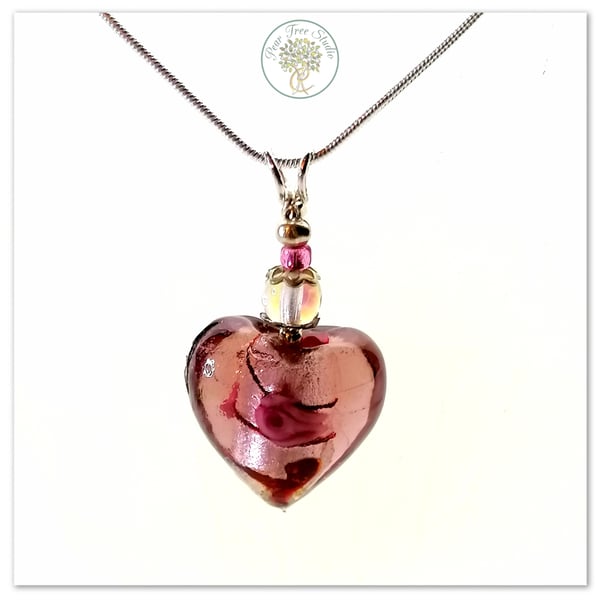Dark pink Murano glass heart necklace on a silver plated chain