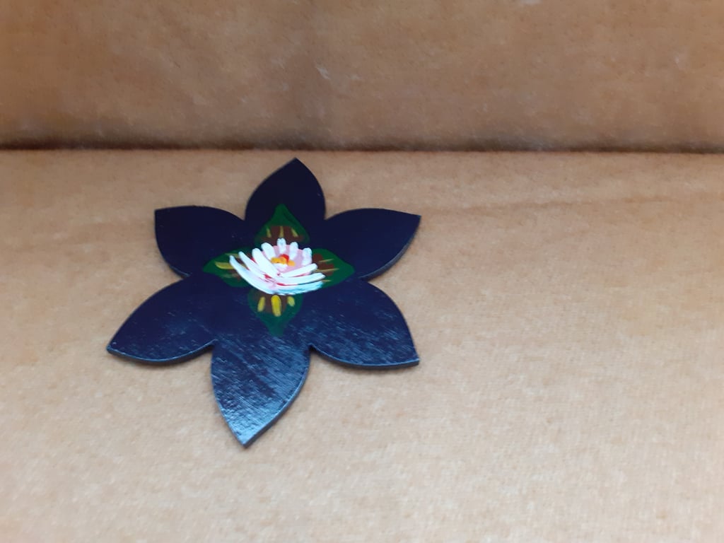 Dark blue flower shaped fridge magnet with canal art style rose