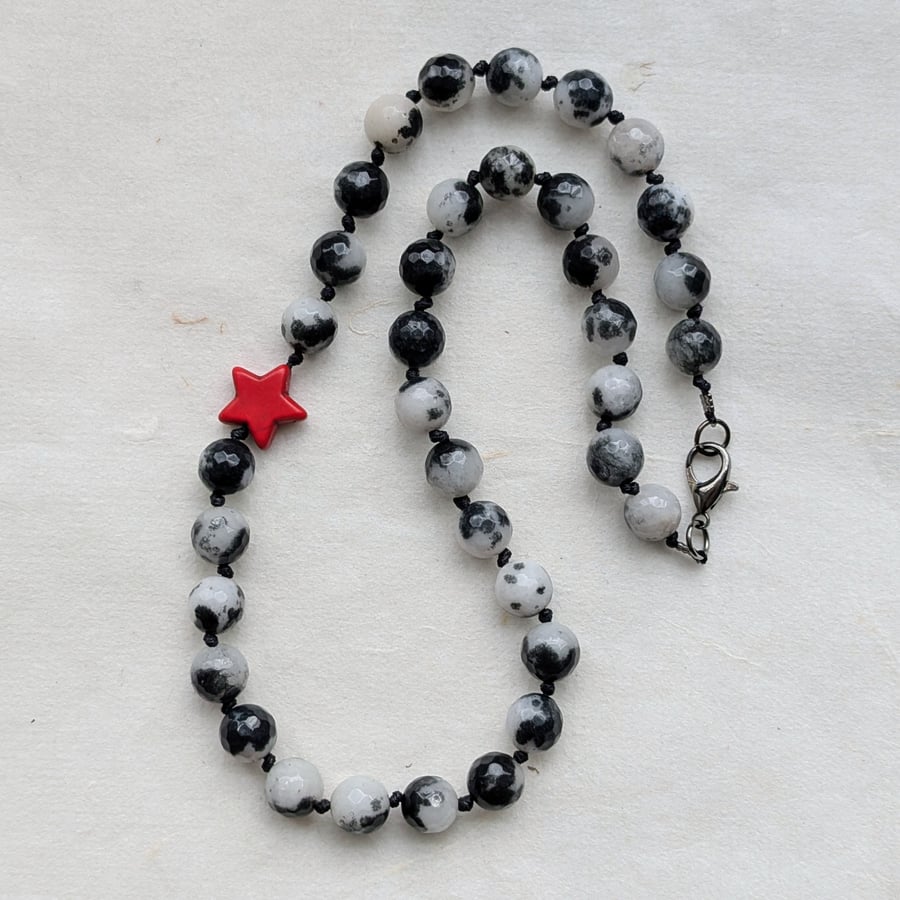 Black and white jade necklace with red howlite star