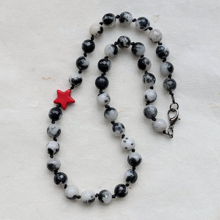 Black and white jade necklace with red howlite star