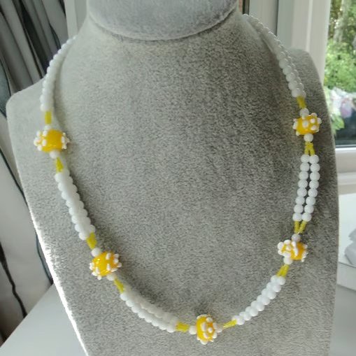 Summer Seconds -Necklace with handmade lemon yellow glass beads with white dots 