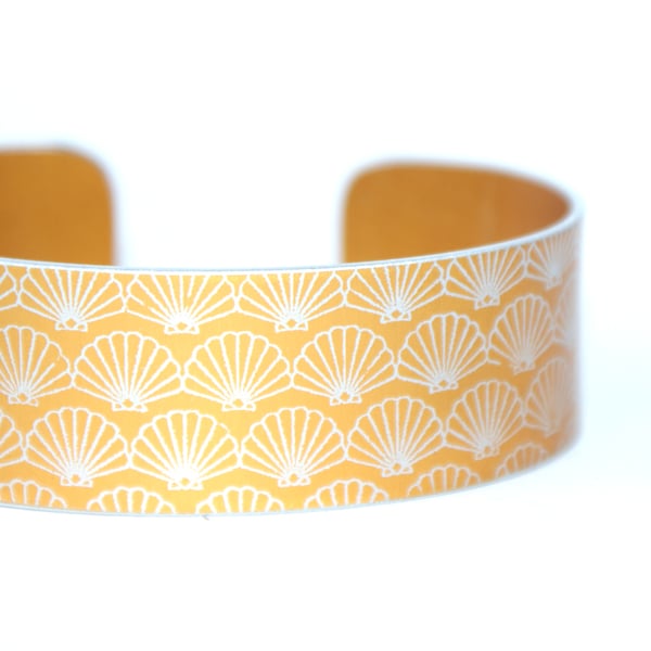 Geometric shell pattern cuff bracelet orangey yellow