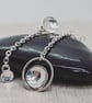 Domed Silver Mismatched Earrings - Image 5