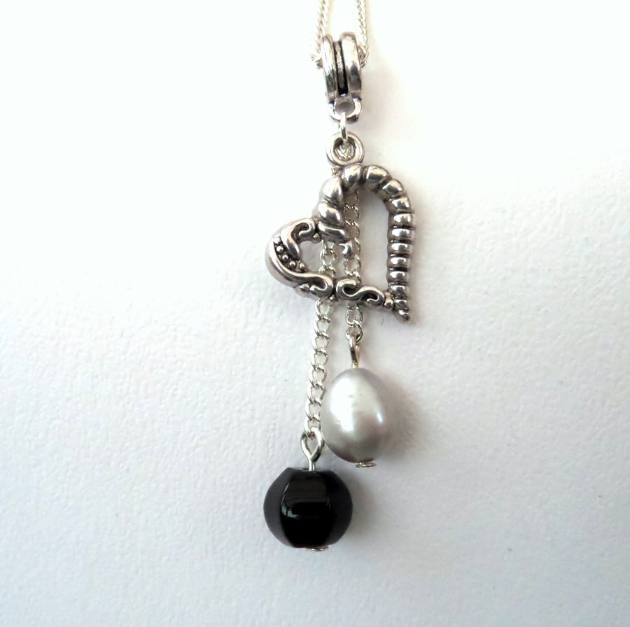 Black onyx and silver pearl heart charm necklace