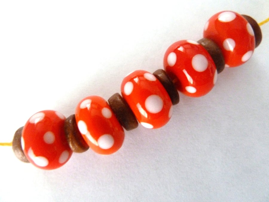 orange spot lampwork beads