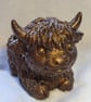 Baby highland cow candle holder . Gold glitter and dark brown  - Image 1