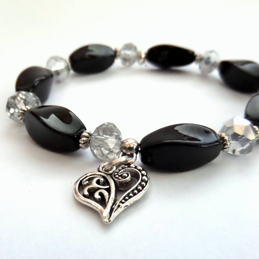 Black & silver stretchy bracelet, with heart charm