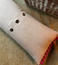 Long linen feature cushion with pompom trim - Image 9