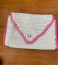 Crocheted cotton and silver yarn small clutch bag